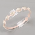 Pink lace elastic headband for babies featuring floral pearls on a display ring - Pink Orange Pearl Lace (MB686)