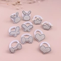 Dettaglio di 10 elastici per capelli bimba con perle a forma di coniglio e corona - Set Misto Perle Strass(MT026) / Confezione da 10 fili