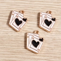 Macro view of three alloy playing card A and K charms with white and black enamel drip finish - 10 Pieces Pack / Black