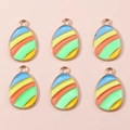 Détail de breloques en forme d'œufs de Pâques rayés pour bijoux et accessoires DIY - Œuf à Rayures Macaron (1114)