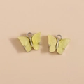 Coppia di ciondoli a farfalla in acrilico giallo effetto marmo con cornici in metallo argento - Motivo Marmo Giallo (YD979huangse)