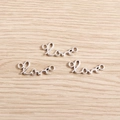 Detail of silver Love script charms with dual loops for DIY necklace connectors - Antique Silver