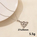 Minimalist silver triquetra pendant necklace in stainless steel on a textured background - Silver Triangle Celtic Knot Style