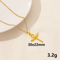 Golden Ankh pendant necklace with wings on white porcelain plate detail - Gold Winged Ankh (S897-G+N22-G)