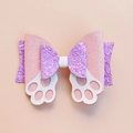 Close-up of glittery pink and purple bow hair clip with white cat paw cutouts - Rabbit Paw Bow (MC6507)