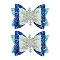 Close-up of blue glitter hair bows with silver snowflake accents for Christmas styling - Blue Double Pack (MS5960)