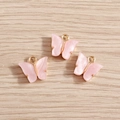 Dettaglio di ciondoli a farfalla rosa con base in lega dorata per creazione di gioielli - Rosa Pallido (YD003fense)