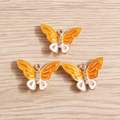 Set di ciondoli a farfalla arancioni e bianchi con cristalli per la creazione di gioielli - Smalto Arancione e Bianco Strass (YD002huangse)