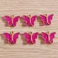 Set of six pink acrylic butterfly pendants with gold metal frames and sparkling sequins - 10 Pieces Pack / Rose Red