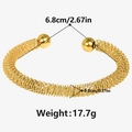 Detail view of gold mesh coil bracelet with size specs and smooth metal ball ends - Gold