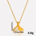 Macro shot of 304 stainless steel fishtail pendant with white shell inlay and 1.5cm dimension - Gold Mother of Pearl Necklace