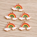 Close-up of rainbow cloud charms with colorful enamel finish for DIY jewelry making - Red