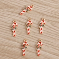 Detailed view of red and white enamel Christmas candy cane charms for DIY crafts - 10 Pieces Pack / Red