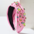Détail du serre-tête rose de Pâques avec œufs émaillés et pierres précieuses colorées - Rose