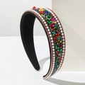 Close-up of vintage baroque headband with colorful rhinestones and double-row pearls - Colorful