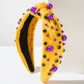 Diadema con nudo amarillo vibrante con perlas púrpuras y diamantes verdes en blanco - Amarillo