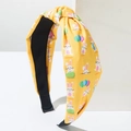 Yellow knotted headband with Easter bunny prints and colorful balloon patterns - Yellow
