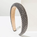 Macro shot of thick baroque headband featuring grey square crystals and velvet lining - Gray