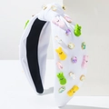 Detalle de diadema blanca con nudo, cristales de colores y adornos de conejo de Pascua - Conejo Blanco
