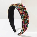 Elegant Baroque headband with colorful rhinestones and gold settings on black velvet fabric - Colorful