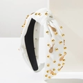 Détail d'un serre-tête noué blanc avec perles dorées et pendentifs raquettes de tennis - Blanc Raquette de Badminton
