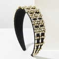Detailed view of luxury baroque headband featuring full crystal rhinestones and gold claws - Black