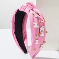 Detalle de diadema rosa de tela con conejitos esmaltados y pedrería brillante - Rosa