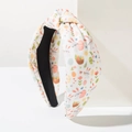 Detail view of knotted Easter headband featuring colorful bunny and egg fabric patterns - Cream White Gold Foil