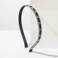 Detail of elegant black headband with white pearls and black diamond-cut gemstones - Pearl Black