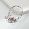 Silbernes Edelstahl-Armband mit rosa Anhängern, Herzschloss und Kirsch-Motiv für Damen - Rosa