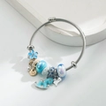 Bracciale argento a corda con ciondoli blu, cavallo smaltato e cuore Gemini - Blu