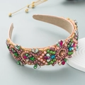 Detail of luxury padded headband with colorful rhinestones and pink pearls on satin - Champagne Multi
