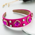 Baroque hot pink velvet headband with large pink gemstones and crystals on grey background - Rose Red