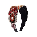 Close-up detail of luxury Baroque headband featuring red and white rhinestones on black velvet - Red