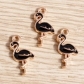 Three gold-plated flamingo alloy charms with black enamel finish for DIY jewelry crafting - 10 Pieces Pack / Black