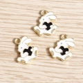 Close-up of three white rabbit alloy pendants with black hearts for DIY jewelry making - 10 Pieces Pack / Black