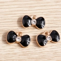 Tres colgantes de lazo en esmalte negro con diamantes de cristal y marco de aleación - Negro