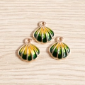 Three gradient shell pendants with gold edges on wood surface for DIY jewelry making - Yellow Green Gradient Shell Enamel (YD489shenlvse)