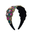 Detailed macro view of vintage baroque headband with multi-colored crystals and velvet base - Colorful