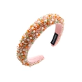 Detail of multi-color beaded headband with handmade label and pink woven fabric - Pink Multi