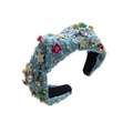 Detail of blue denim headband with colorful gemstones and metal star embellishments - Blue