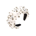 Detailed view of cream fabric headband with football decor, pearls and rhinestones - White
