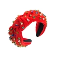 Diadema roja con nudo y cristales barrocos de colores sobre fondo blanco - Rojo