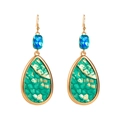 Detail view of water drop earrings with green snakeskin texture and blue crystal - Green