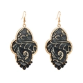 Detail of vintage gold-rimmed earrings with grey embossed leather and black bead drops - Black Gold Scroll Texture / Black
