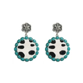 Close-up of vintage round earrings with turquoise beads and cow print leather texture - Turquoise