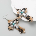 Close-up of leopard print cross earrings with turquoise stone and silver hook - Dark Leopard Style / Dark Coffee