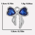 Macro view of 304 stainless steel bow pendant with heart blue stones and 1.8cm scale - Dark Blue Silver Base (S2025-S-D)