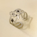 Detail of silver hollow ring with Hamsa Hand and celestial symbols with black stones - Silver (Black Rhinestone)