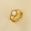 Detail of gold sunburst ring with opal stone on minimalist pleated fabric background - Milky White Natural Stone (J816-G-W)